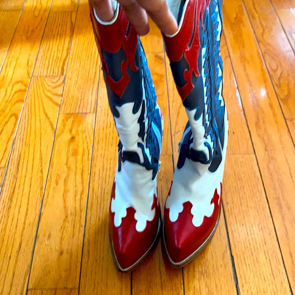 Jeffrey Campbell leather knee high boots.